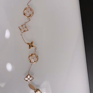 Woman’s Louis Vuitton Rose-gold bracelet.